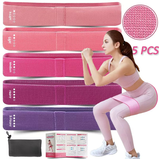 Woman doing squat with 5-piece fabric resistance loop bands set – home gym workout